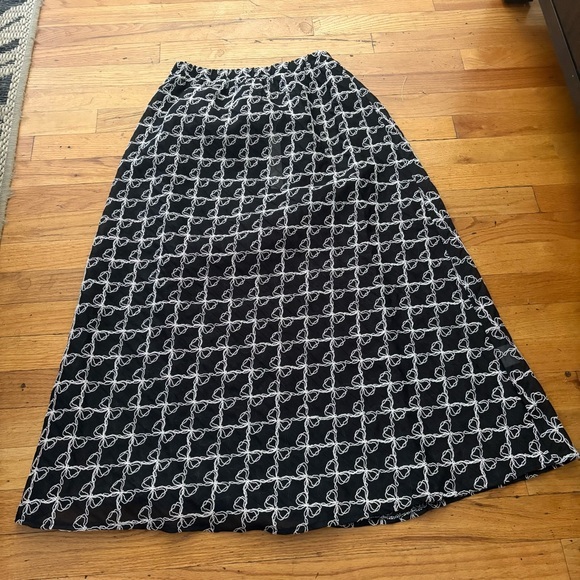 Lisa Says Gah Dresses & Skirts - Lisa Says Gah Sheer Black Bow Print Skirt Size XXS